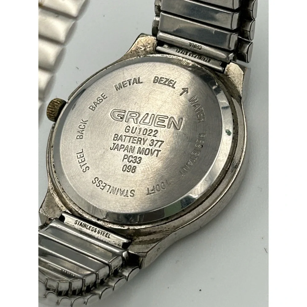 Gruen men's watch GU1022 Blue Face Stainless Steel And Gold Stretch Band Read